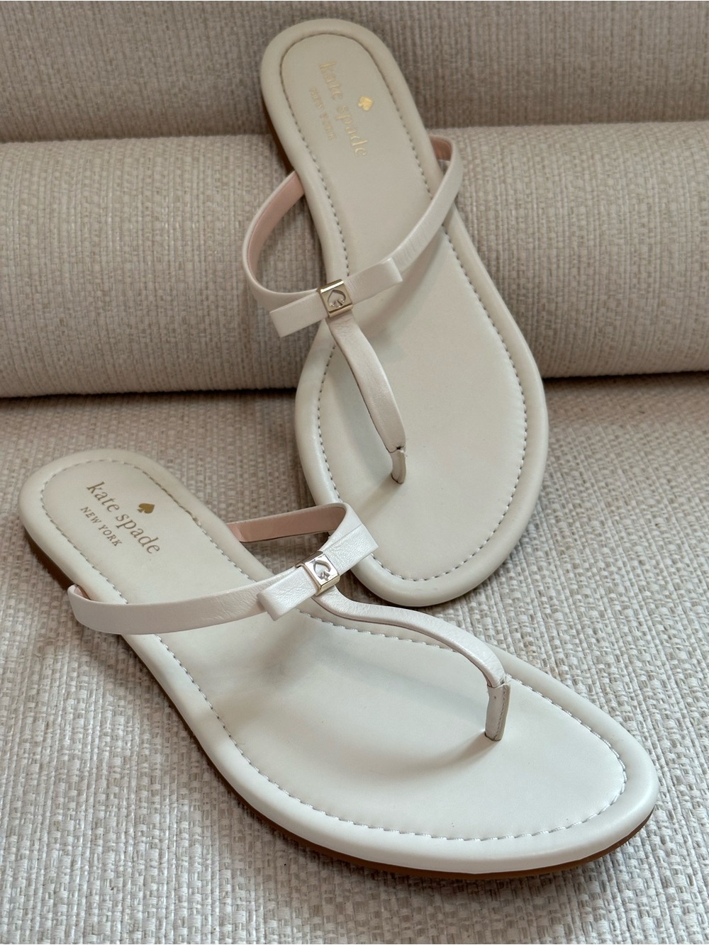 kate spade Cream Bow Thong Sandals with Gold Accent